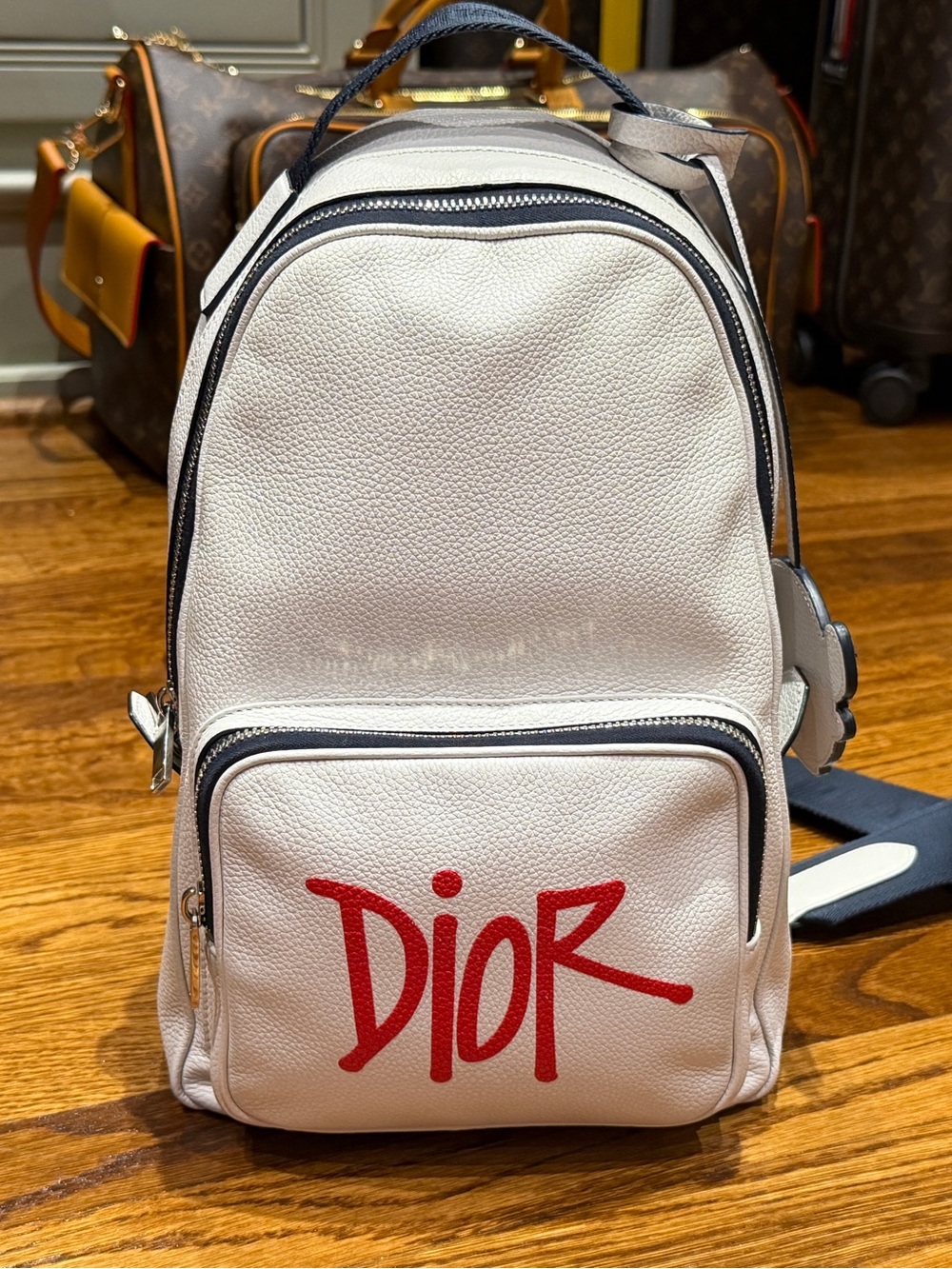Dior Men’s Cream Leather Backpack with Red Logo